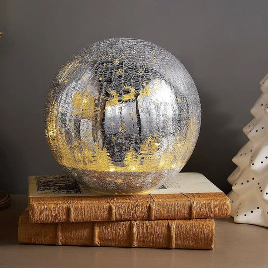 Light-up cracked glass ball with Jesus and reindeer design