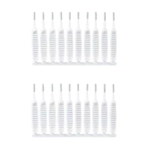 Anti-clogging cleaning brush for holes