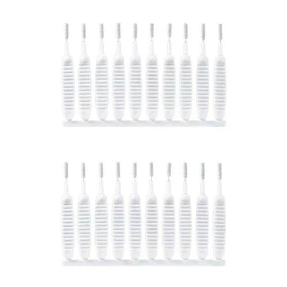 Anti-clogging cleaning brush for holes